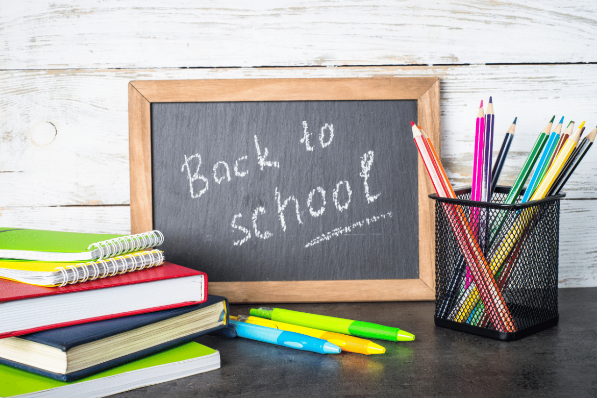 School supplies and small chalkboard with Back to School written on it