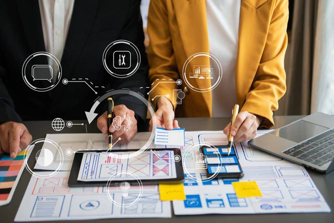 Graphic designer planning application process development prototype wireframe for web smart phone